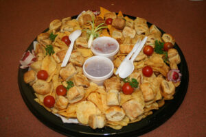 Savoury assortment with sausage rolls, crisps and chips